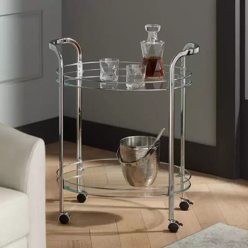Chariot de service ovale à 2 niveaux Carli en acier chromé moderne 26 x 18 1/4, roulettes en argent, étagères en verre transparent pour salon
